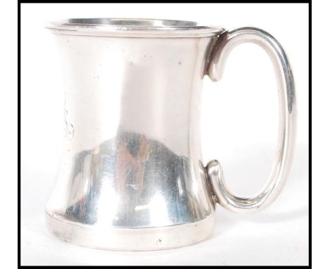 Hunting interest- A silver hallmarked toddy cup of simple form having a plane shaped handle with monogrammed front. Hallmarke