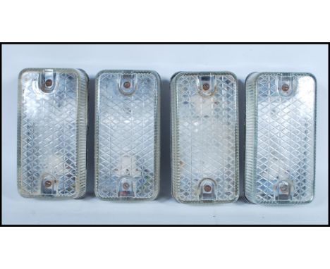 A group of four vintage retro 20th Century industrial prismatic glass bulkhead lights with metal backed cases.&nbsp;Complete 