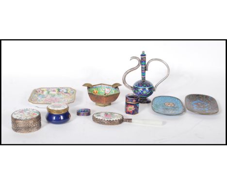 A collection of 20th Century enamel wares to include two Chinese Cloisonne dishes one decorated with a peony and the other a 