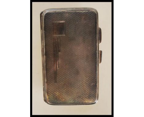 A silver hallmarked cigarette case with engine turned decoration and plain cartouche. Hallmarked for Birmingham by Joseph Rog