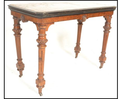 A 19th Century Victorian walnut rectangular fold-over top card table,&nbsp;quarter veneered top,&nbsp;hinged and swivel top r