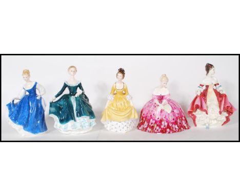 A collection of Royal Doulton ceramic figurines to include Southern Belle HN 1957, Kay HN 3340, Janine HN 2461, Victoria HN 2