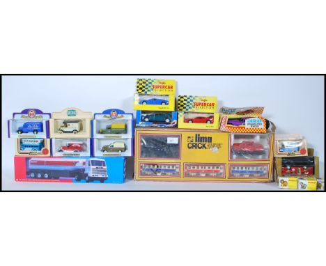 A collection of boxed diecast model cars and lorries to include Esso Road Tanker, Oxford die cast, Lledo, Maitso, Harrods Lon