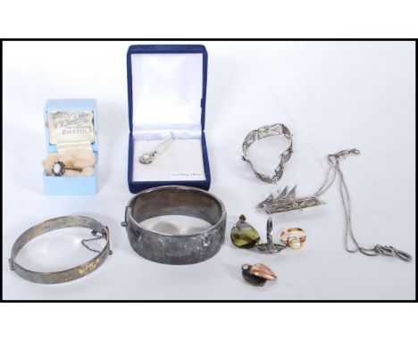 A collection of silver to include hallmarked ladies large chase decorated bangle , silver hallmarked opalite stone set ring, 