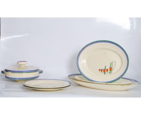 Clarice Cliff for Newport Pottery early 20th Century part dinner service in the Cafe Au Lait Harebell Bizarre pattern consist
