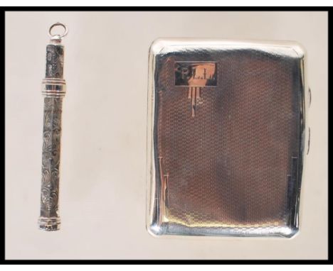 A vintage early 20th Century W Wilkinson Ltd silver hallmarked vesta case having engine turned exterior (hallmarked Birmingha