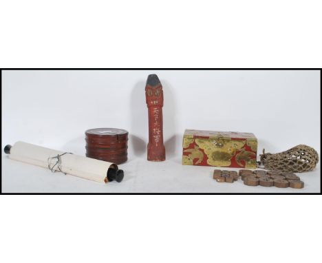 A selection of Chinese and Oriental items to include a carved wood Chinese fertility ornament of phallic form, a selection of