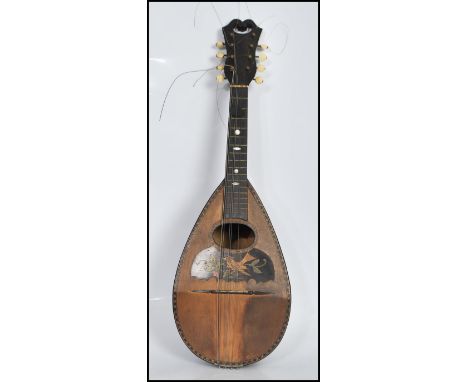 An vintage early 20th Century eight string&nbsp;rosewood cased mandolin instrument, with mother of pearl inlay to the fret bo