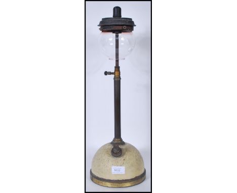 A vintage early 20th century industrial Tilly paraffin table top lamp having a domed base with original paintwork, with a cen