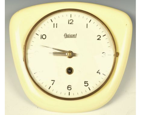 Hugo Hettich - Garant - K112 - A mid 20th century 1950's German retro vintage ceramic wind up wall clock having an Arabic cha
