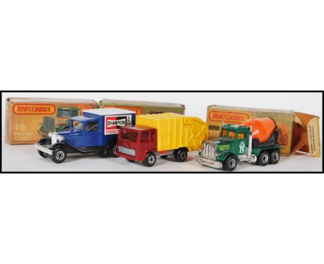 A group of three Matchbox 75 1:75 scale diecast toy model cars / trucks to include 36 Refuse Truck, 57 Carmichael Rescue Vehi