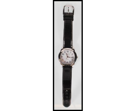 A Tissot 1853 PR50 gentleman's chronometer wristwatch set to a leather strap. Stainless steel case with white face. Serial J3