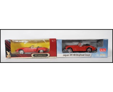 Two boxed diecast scale model cars to include the Jaguar Xk140 drophead coupe by Sun Star and a 1971 E-Type Jaguar.