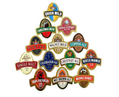Selection of vintage brass beer pump badges 
