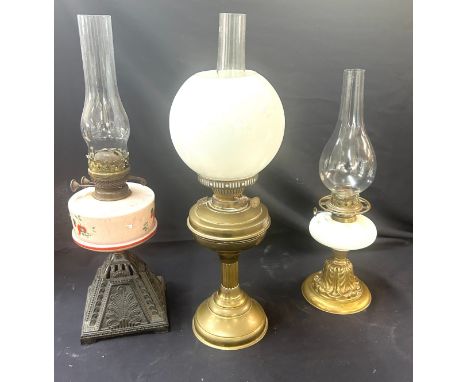 3 Vintage oil lamps, all with funnels one with shade