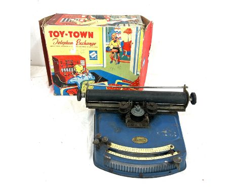 Antique and vintage toys, radio switchboard in the original box, and an antique childs cast metal one punch typewriter