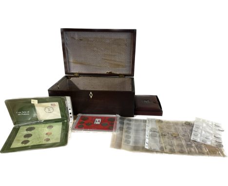 Vintage wooden box with a selection of assorted coins 