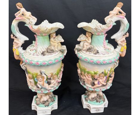 Pair Christian Nonne style Volkstedt porcelain ewer / pitcher, both have been repaired to spout, overall height of each: 16 i