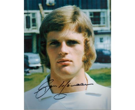 Gordon McQueen signed 10x8 inch colour photo pictured during his time with Leeds United. Good condition. All autographs come 