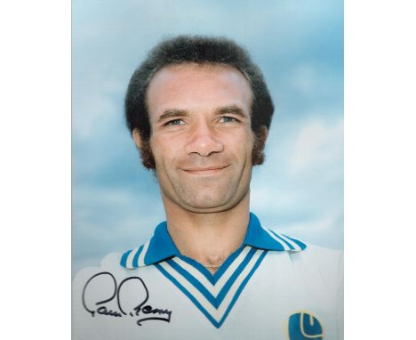 Paul Reaney signed 10x8 inch colour photo pictured during his playing days with Leeds United. Good condition. All autographs 