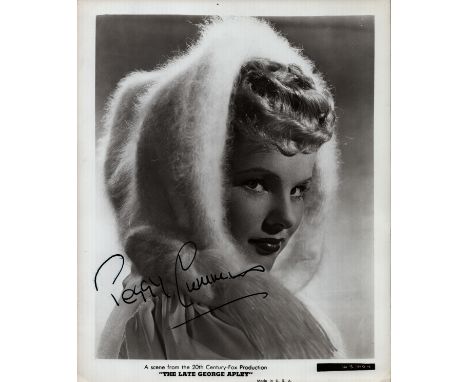 Peggy Cummins (1925-2017), actress. A 10x8 inch publicity photo for her film, "The Late George Apley" (1947), signed in fount