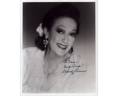 Dorothy Lamour signed 10x8 inch black and white vintage photo. Dedicated. Good condition. All autographs come with a Certific