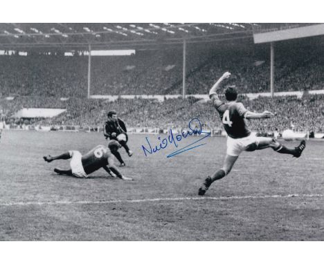 Autographed NEIL YOUNG 12 x 8 photo : B/W, depicting Manchester City centre-forward NEIL YOUNG scoring the winning goal in th