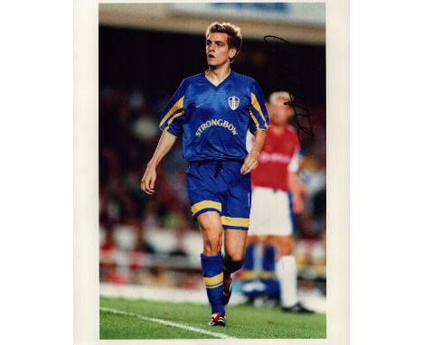 Jonathan Woodgate signed 10x8 inch colour photo pictured in action for Leeds United. Good condition. All autographs come with