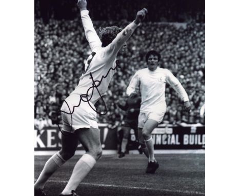 Mick Jones signed 10x8 inch black and white photo pictured while playing for Leeds United. Good condition. All autographs com