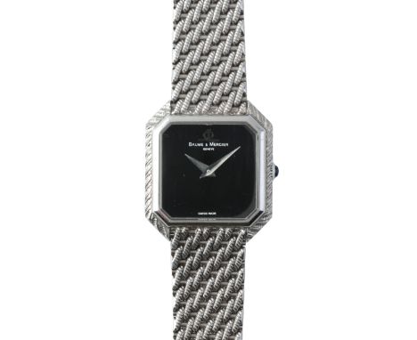 BAUME ET MERCIER: A LADY'S DRESS WATCHin 18ct white gold, circa 1980s, with manual wind movement, black dial, sapphire-set cr