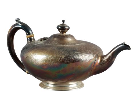 A VICTORIAN SILVER TEAPOT by either William Moulson or Walter Morisse, London 1845, the squat bulbous body with leaf engravin
