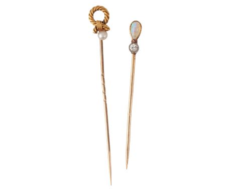 TWO ANTIQUE GEM-SET STICK PINSincluding an opal and diamond stick pin and a pearl stick pin with ropework knot design, displa