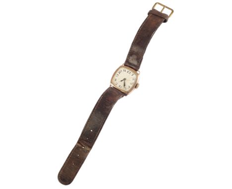 A GENTLEMAN'S 9CT GOLD WRISTWATCHwith manual wind movement, the dial with black Arabic numerals and dark blue steel hands, ci