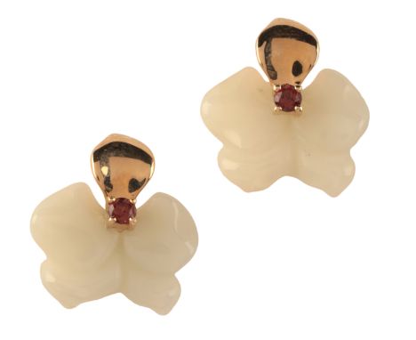 A PAIR OF JADE AND GARNET EARRINGSin 14ct gold, each comprising a carved jadeite jade orchid, set to the centre with a round 