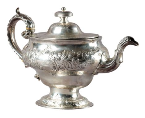A GEORGE III SCOTTISH SILVER TEAPOT by James Hewitt, Edinburgh 1771, the oval body embossed with flowers and vacant cartouche
