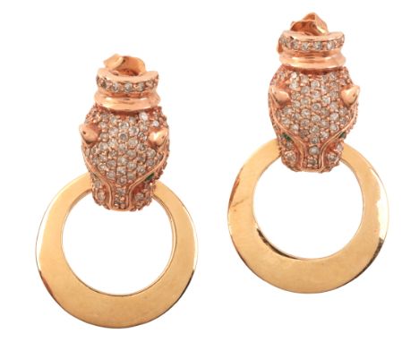 A PAIR OF EMERALD AND DIAMOND PANTHER DOOR KNOCKER EARRINGSin 14ct rose and yellow gold, each comprising a panther head, pavé