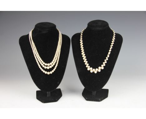 A cased set of imitation 'Pompadour Pearls, Pearls for a Princess' and a further imitation pearl necklace (2)