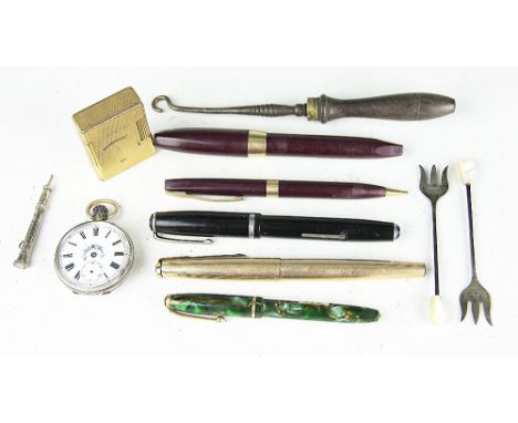 A pair of silver sardine forks, Emile Viner, Sheffield 1963, a silver propelling pencil, a lady's fob watch, the white enamel