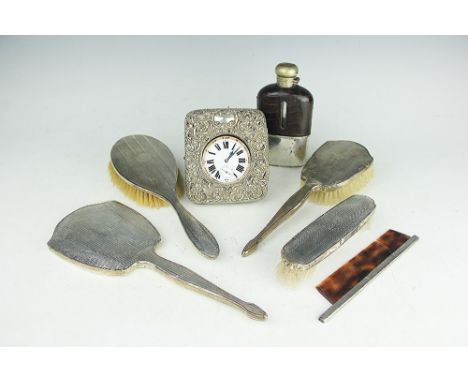 A selection of silver, to include a Goliath pocket watch in base metal case within a silver fronted frame with easel support,