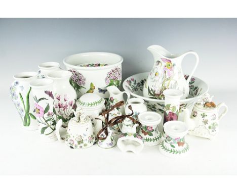 A collection of Portmeirion Botanic Garden pattern kitchen wares, to include a pair of dwarf candlesticks, three jardiniere's