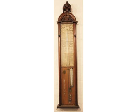 A late 19th century Admiral Fitzroy carved oak mercury barometer, with brass fittings, 118cm H