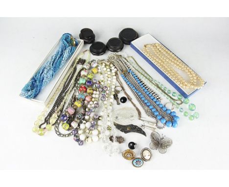 A collection of jewellery to include a single strand Venisian glass 'wedding cake' bead necklace, a Victorian seed pearl set 