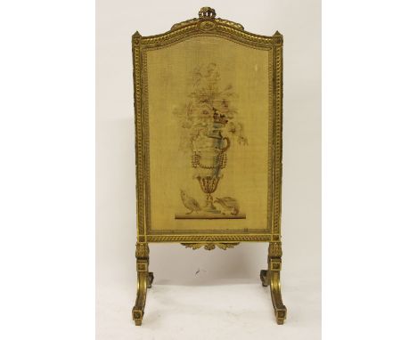 A late 19th century French carved giltwood and gesso fire screen, in Louis 16th style, 94cm H x 45cm W