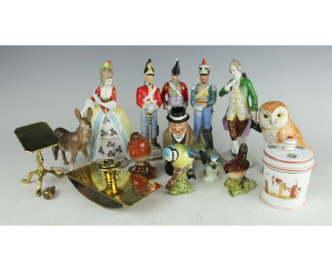 A Beswick model of an owl, and four bird models, three continental figures of soldiers, a pair of figures, a brass blotter an