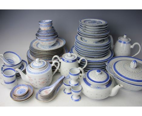 A 20th century Chinese rice grain pattern extensive dinner service, to include; dinner plates, side plates, soup plates, brea