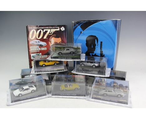 A large collection of James Bond 007 model cars, including examples from Casino Royale, Gold Finger, The Spy Who Loved Me, Di