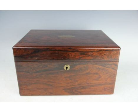 A Victorian rosewood dressing case, mid 19th century, the fitted interior with lift-out tray containing assorted manicure too