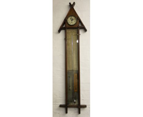 An Admiral Fitzroy walnut mercury barometer, the triangular shaped top with inset time piece, above gauge, (at fault), 132cm