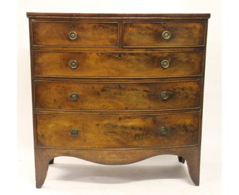 A George III mahogany bow front chest, of two short and three graduated long drawers, on splayed bracket feet, 103cm H x 101c