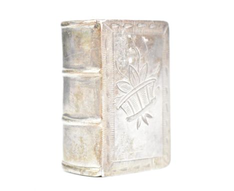 A 19th century continental silver Loderein/snuff box, in the form of a book with a hinged lid stamped with hallmarks, engrave